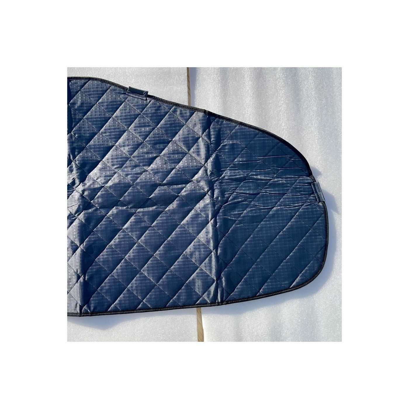 Close-up of the quilted reflective material and bound edge on the Ford Transit window cover