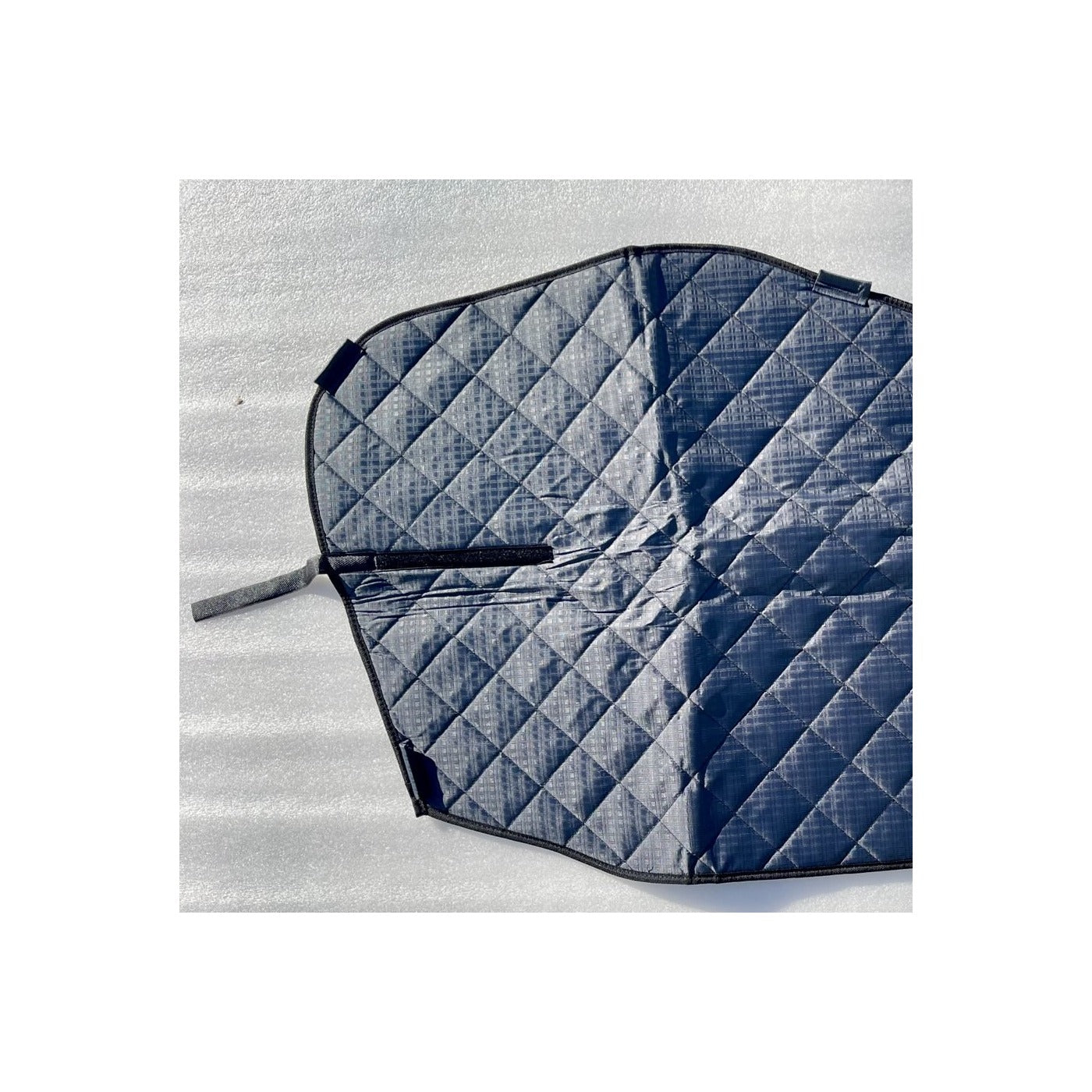 Detail of the paired quilted Ford Transit window covers and edge tabs
